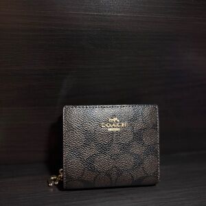 Coach Black and Brown Wallet with Gold Logo